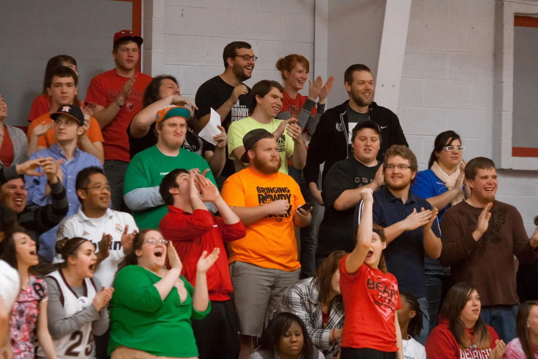 Barclay students cheering in the gym during a game